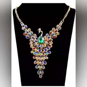 Betsey Johnson beautiful rainbow crystal peacock gold tone bib necklace